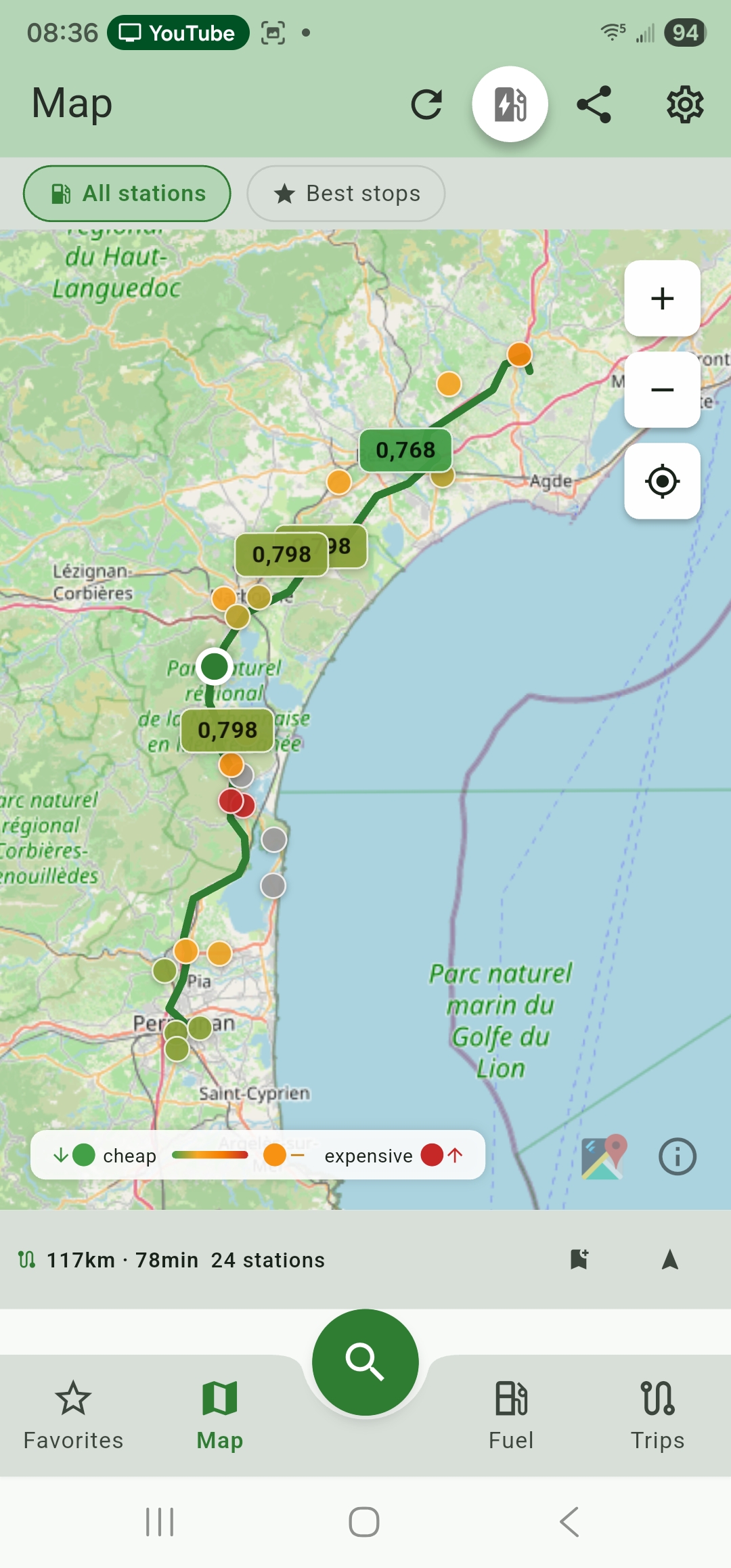 Map showing price pins along a planned driving route corridor